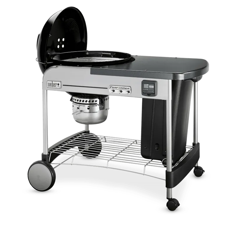 Asador de carbón tipo parrilla negra, ideal para BBQ, asados y ahumados en exteriores